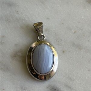 Sterling Silver with Light Blue Oval Stone Pendant - Elegant Women's Jewelry